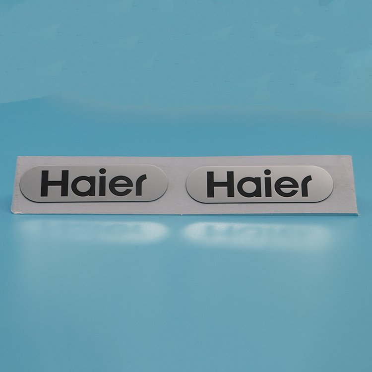 Custom precision etched stainless steel nameplate with brand logo