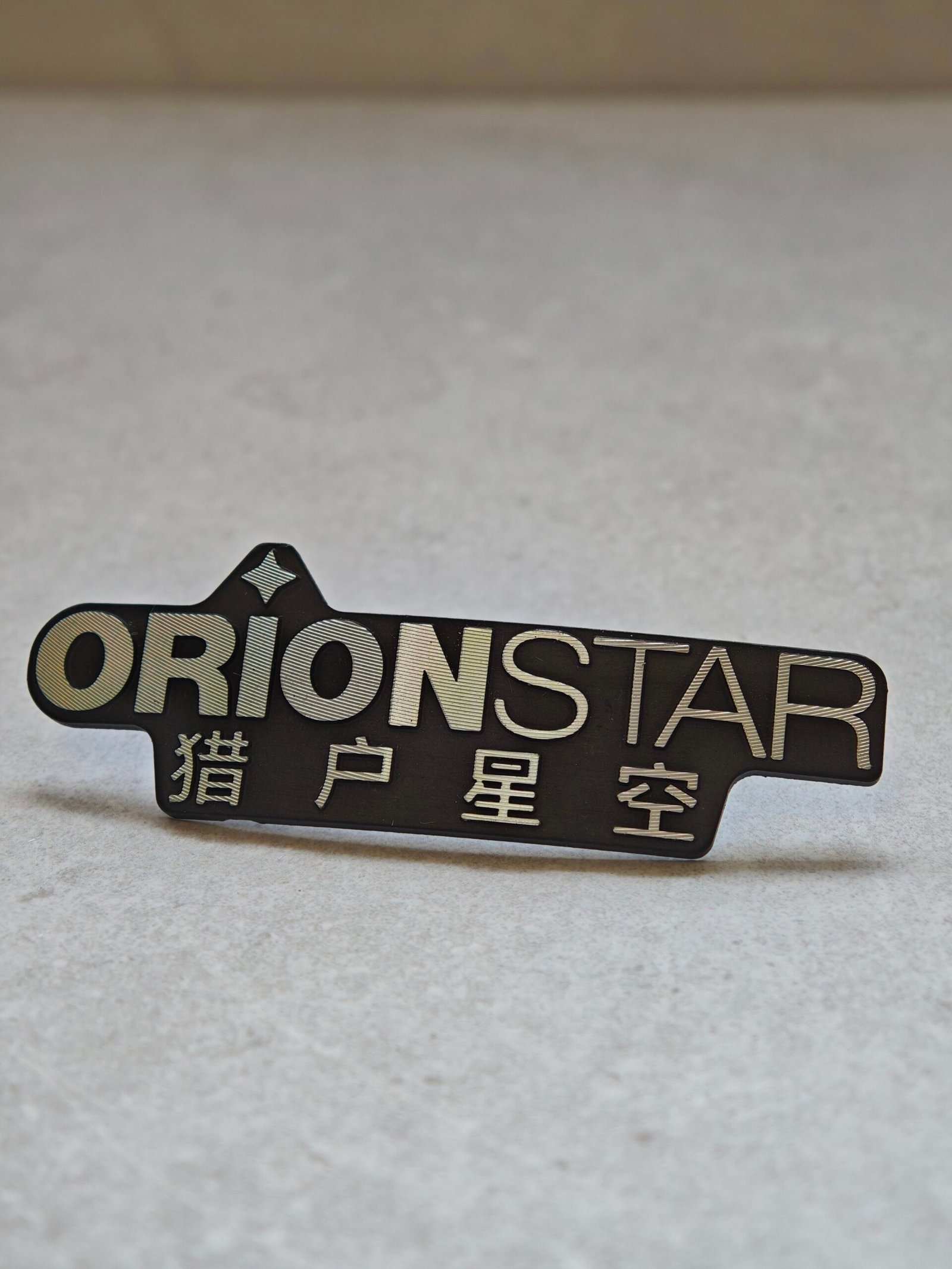 Custom diamond cut aluminum nameplate with 3D metal logo finish