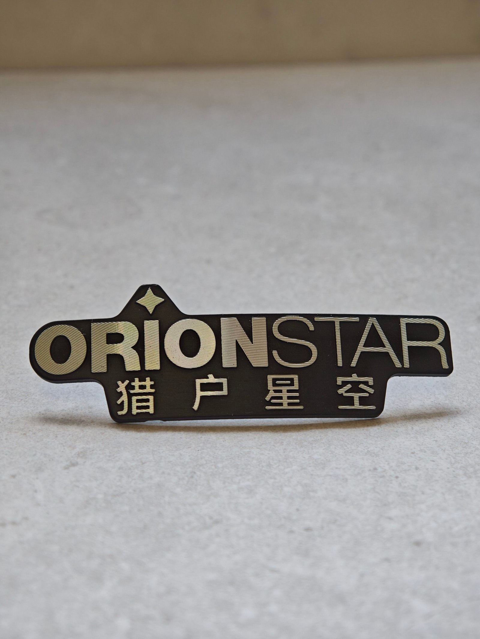 Custom diamond cut aluminum nameplate with 3D metal logo finish